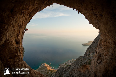 Simon Montmory, climbing Typhoon (7c), Crystal Cave, Telendos Island near Kalymnos, Greece.